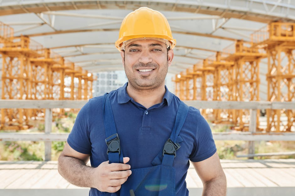 Construction professional inspecting home insulation and siding installation
